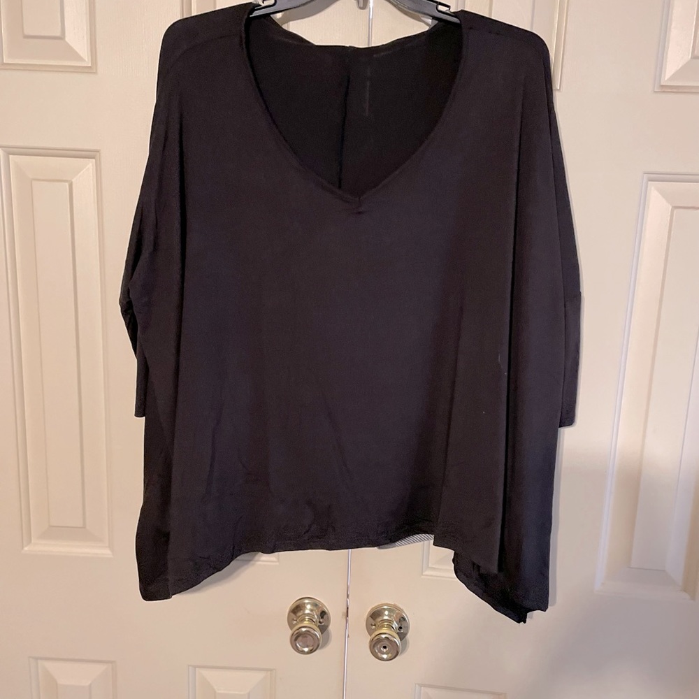 Black 3/4 inch sleeves soft v-neck have 2 of them